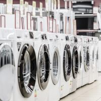 Row of washing mashines in appliance store